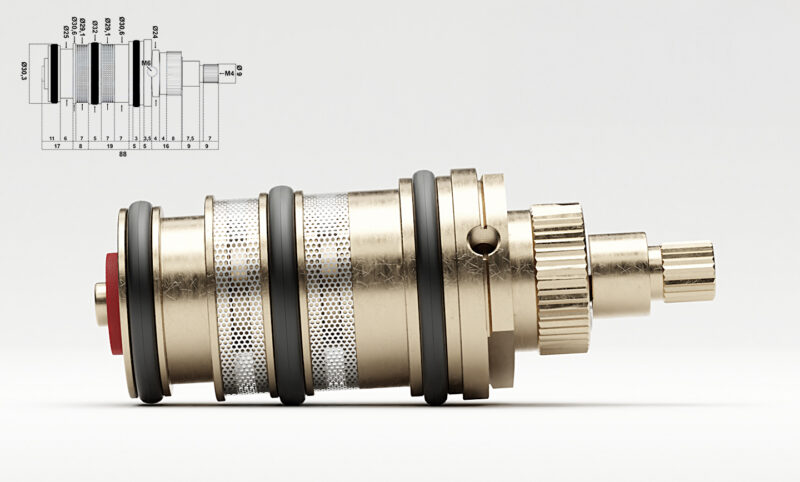 Mosiężny wkład termostatyczny z uszczelkami i sitkiem filtrującym, stosowany w bateriach prysznicowych i armaturze łazienkowej.